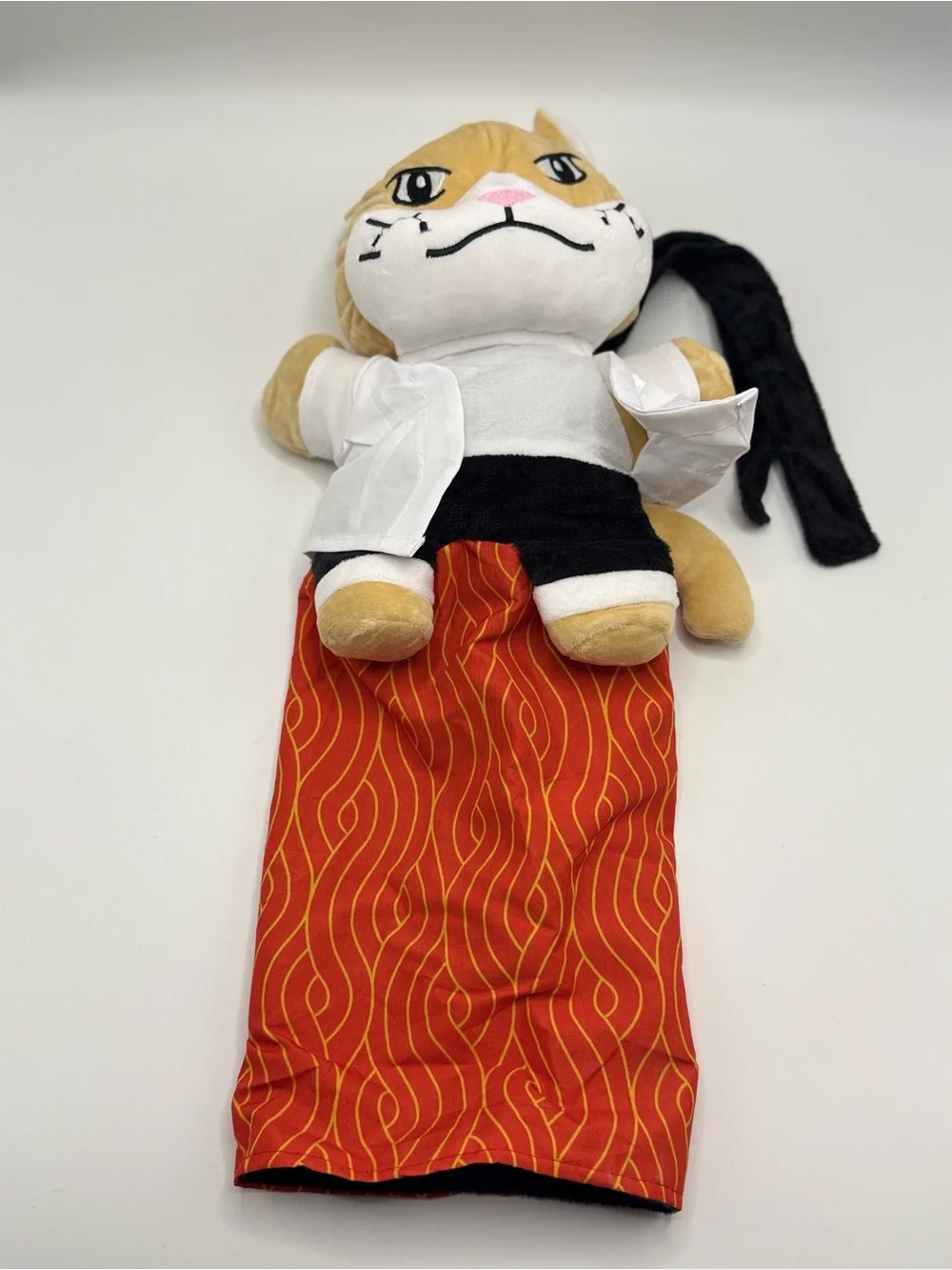 interactive karate cat hand puppet toy with protective arm sleeve.